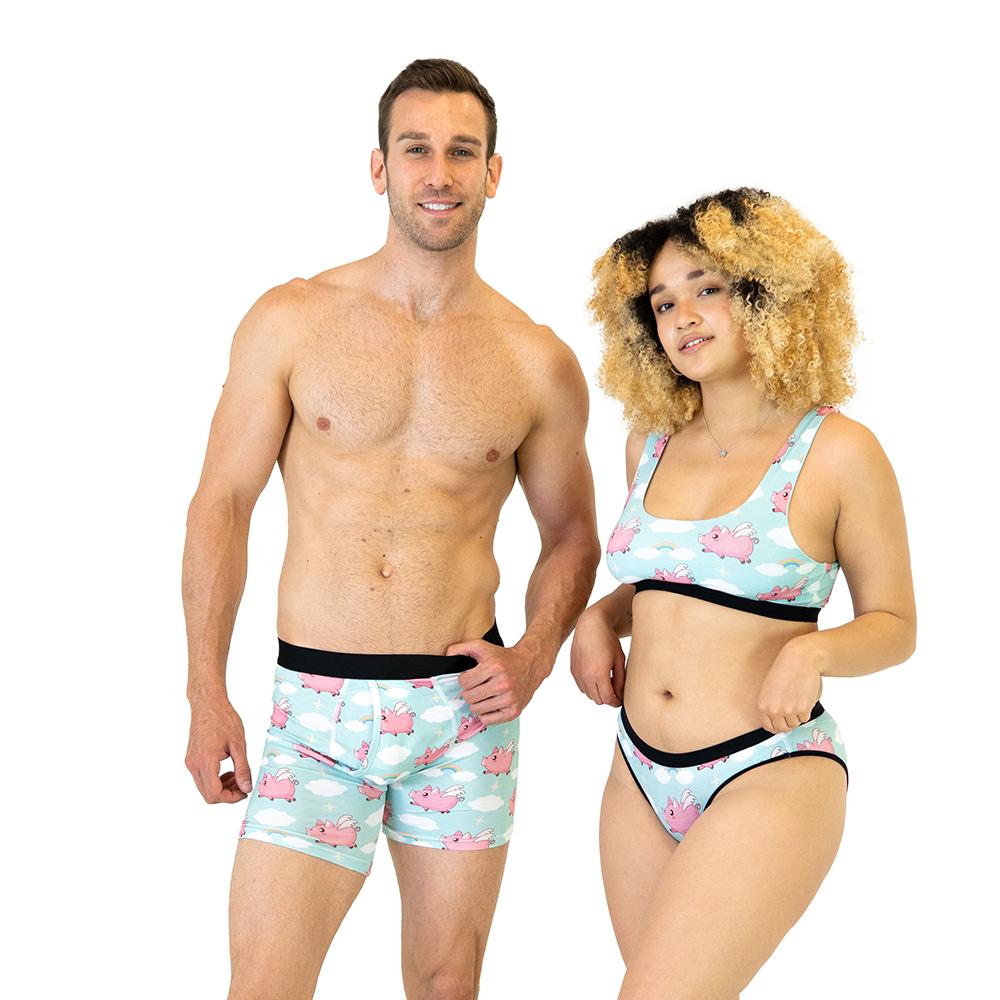 Couple wearing matching pairs Flying Pigs